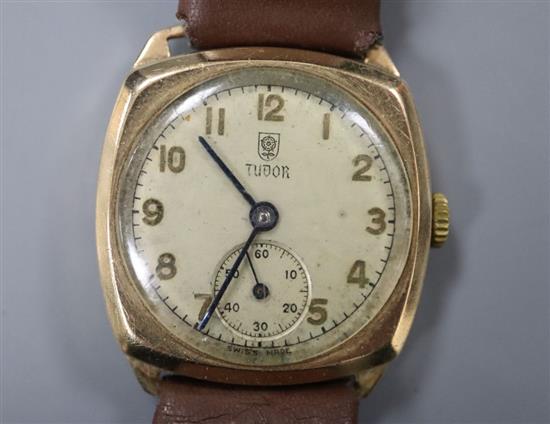 A gentlemans 1940s 9ct gold Tudor manual wind wrist watch, with case back inscription, on leather strap, gross 23.9 grams,